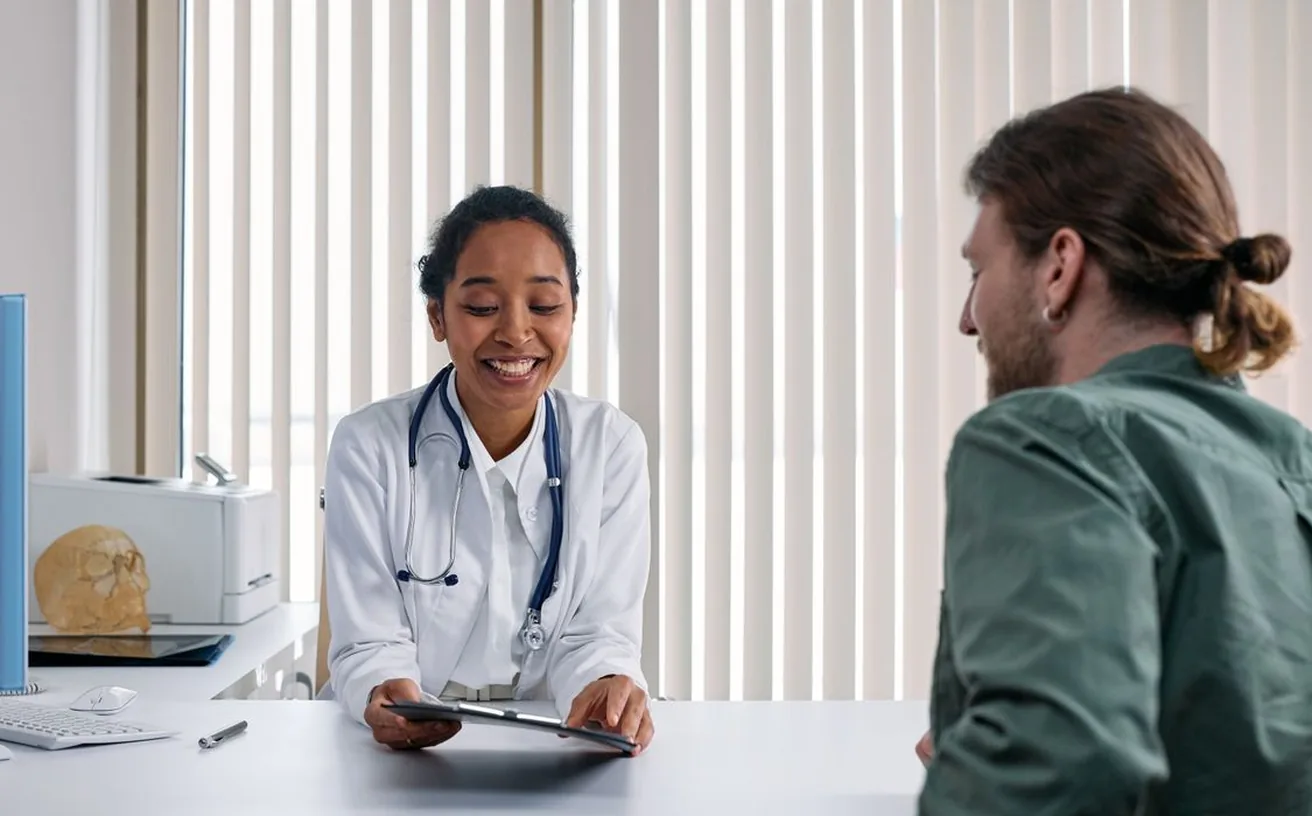 Doctor consulting a patient in a bright clinic