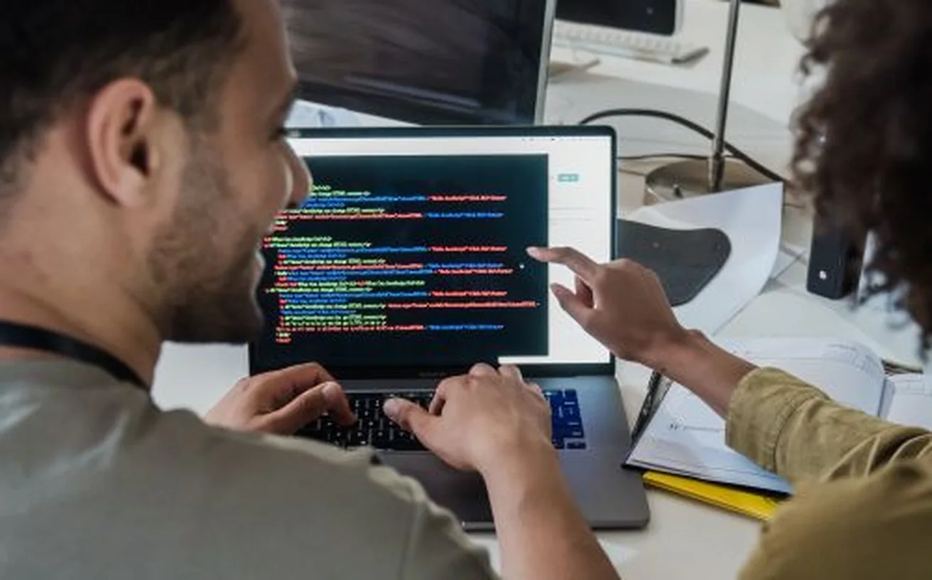 Software developers building ERP and business applications in a modern office